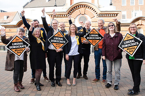 Helen Maguire at clock tower with LibDems