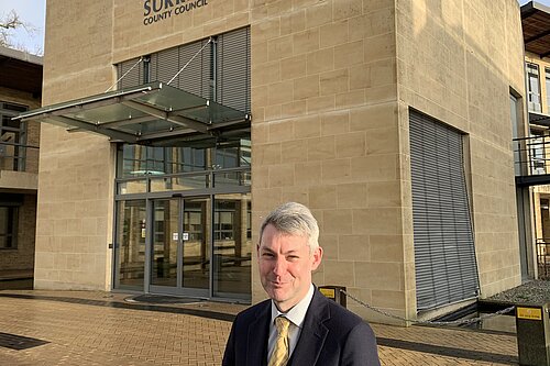 Will Forster outside Woodhatch Place